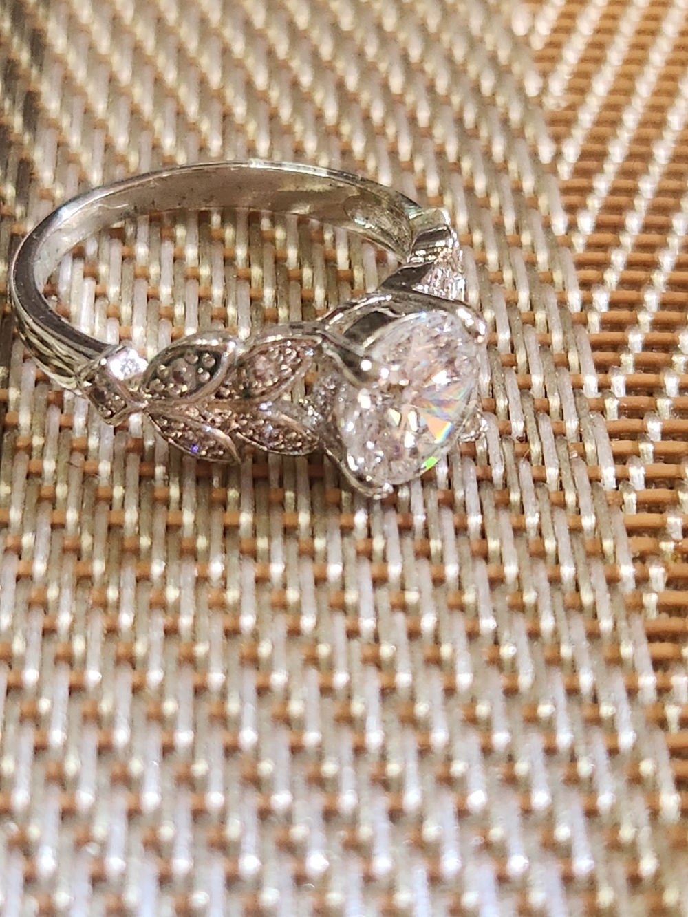 Elegant Silver-Tone Leaf Engagement Ring with Clear Center Stone